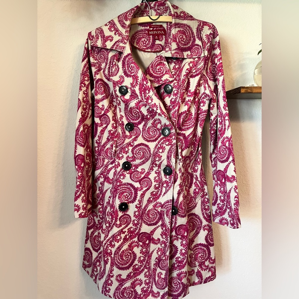 Gorgeous raincoat with paisley pattern and large black buttons.